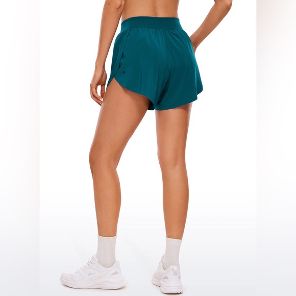 Feathery-Fit Soft Mid Rise Dolphin Lined Shorts 4'' - Picture 2 of 5